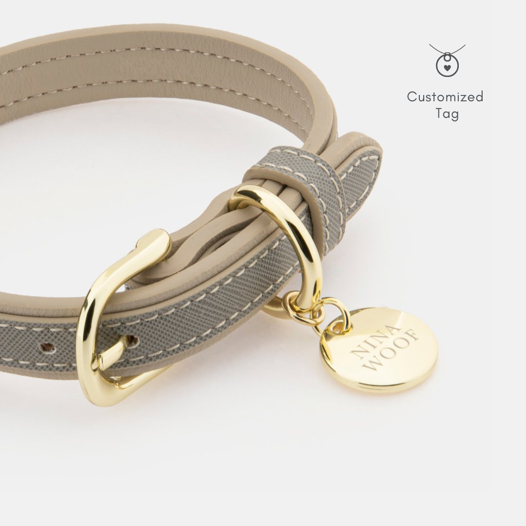 Grey vegan leather dog collar with gold buckle and round nameplate tag