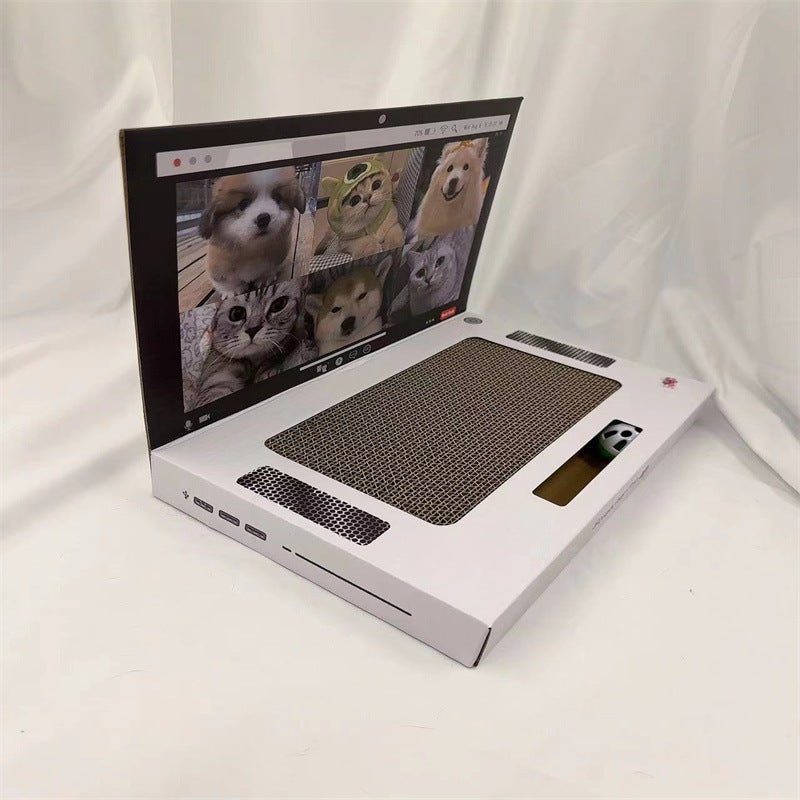 White laptop-style cat scratch board with dark textured scratching pad on open deck