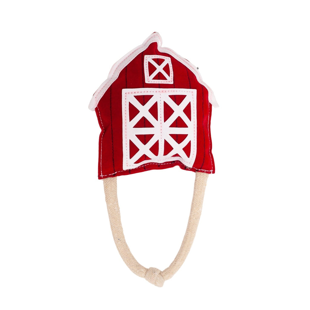 Red barn dog chew toy front with white stitched window design and rope handle loops