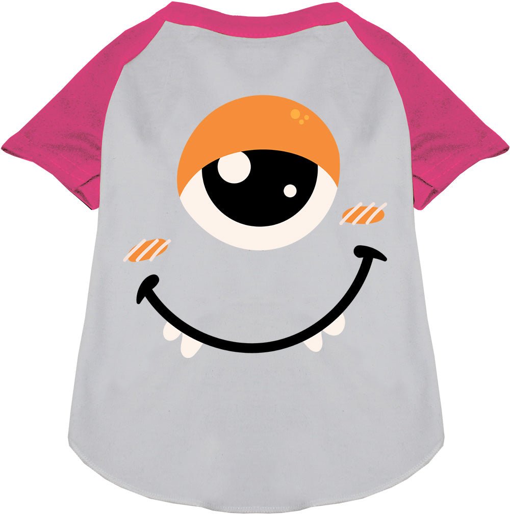 Light grey pet raglan shirt with hot pink raglan sleeves and monster face graphic