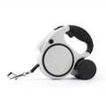 Retractable dog leash reel, white and black casing with chrome clip on leash line