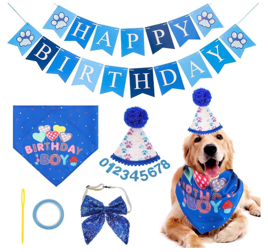 Blue dog birthday hat with pom-poms, bow, and "012345678" banner on bandana