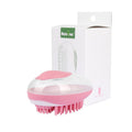 Pink pet bath massage brush in retail box, with soft silicone bristles and textured pad.