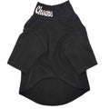Black dog sweater with white logo at the neck and curved knit hem