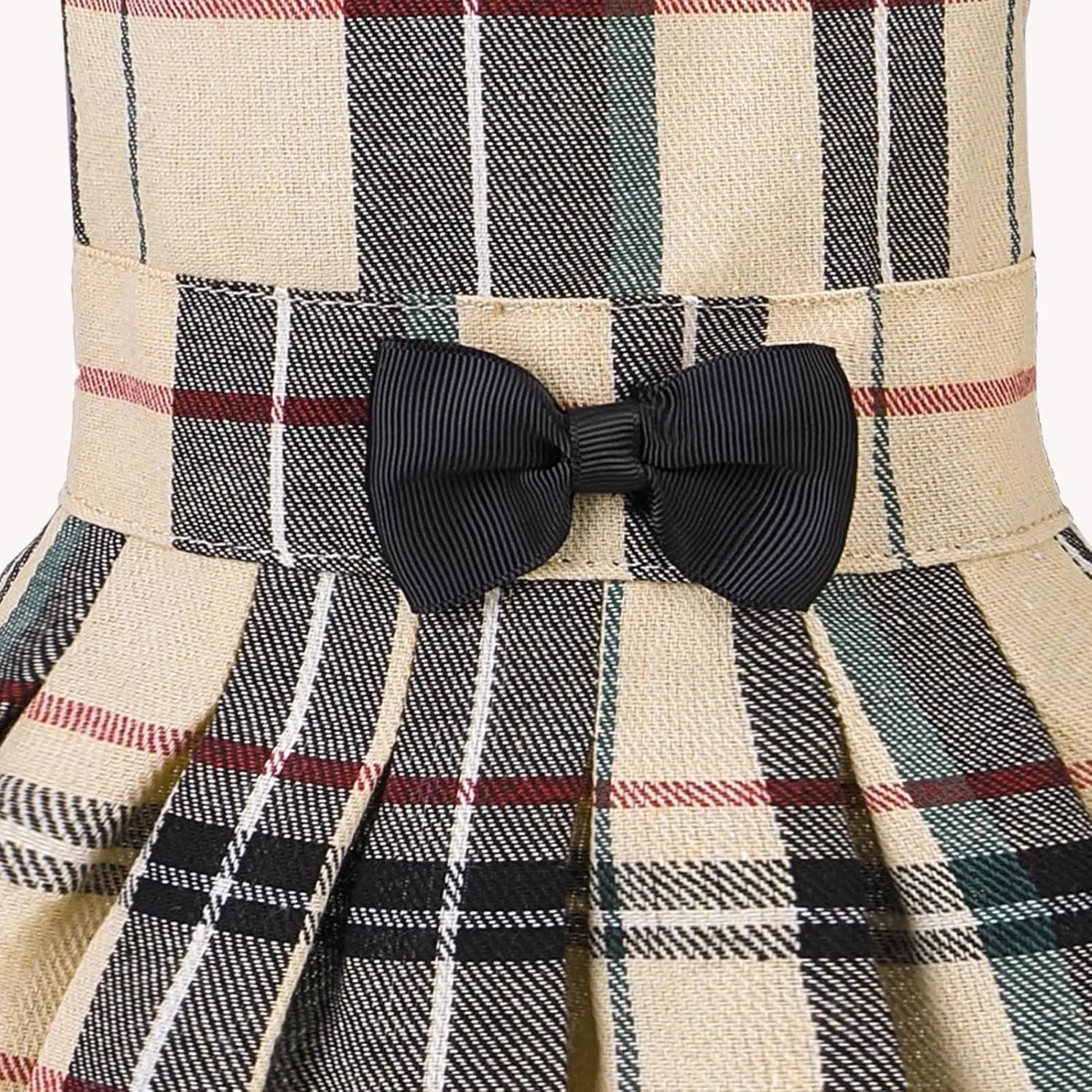 Plaid dog dress bodice close-up with black ribbon bow