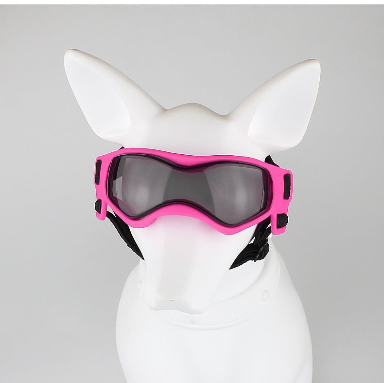 Hot pink dog goggles sunglasses on a white dog head form, front view