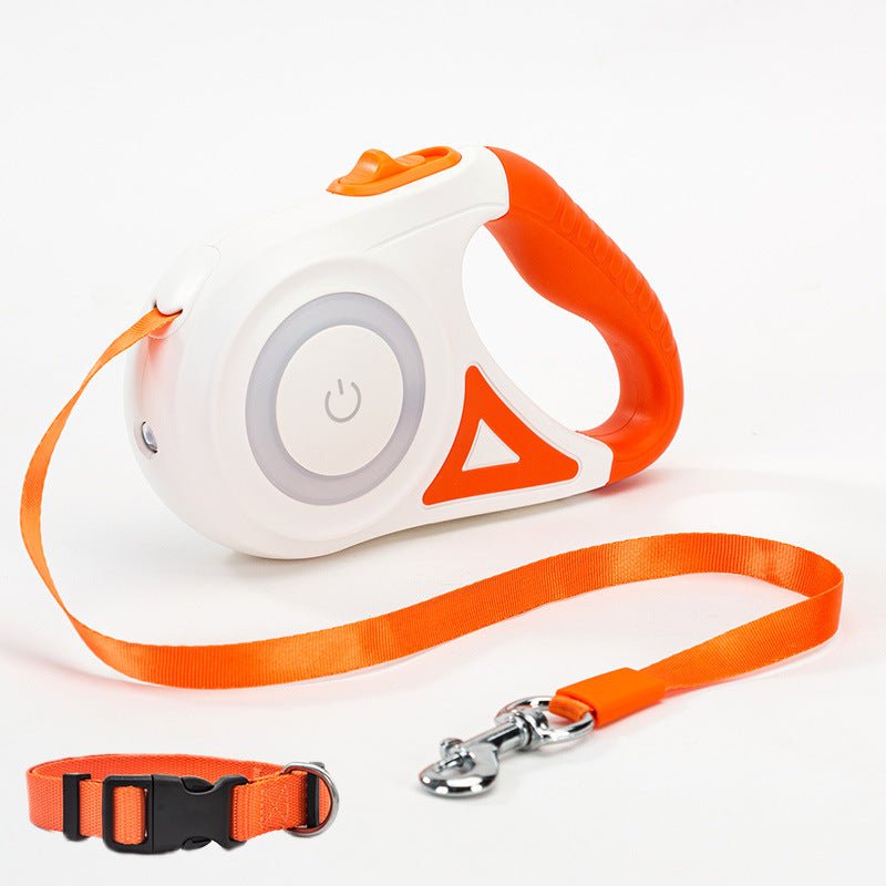 Retractable dog leash set in orange with orange strap, metal clip, and black collar