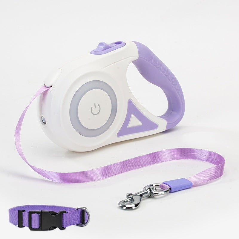 Retractable dog leash set in purple with purple strap, metal clip, and black collar