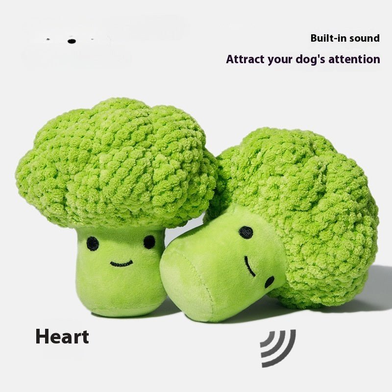 Two green plush broccoli dog chew toys with cute faces and built-in sound.