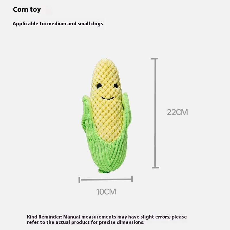 Yellow corn plush dog chew toy with a smiling face and textured knit.