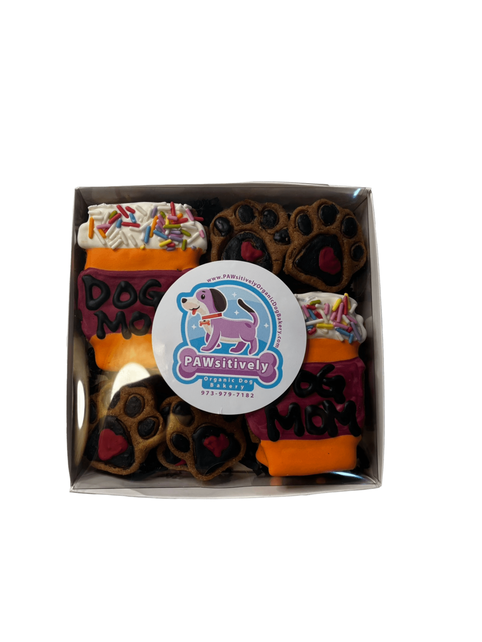 Boxed dog treat cookies with “Dog Mom” and paw shapes; label reads Pawsitively