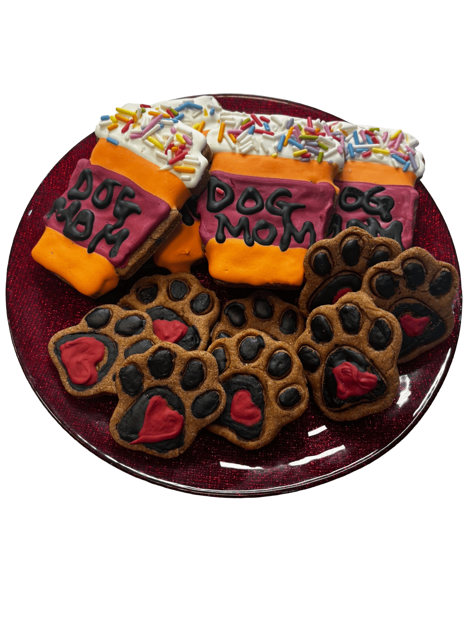 Assorted dog-themed cookies: black paw prints, orange bones, “Dog Mom” icing, sprinkles
