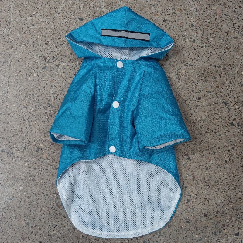 Teal blue dog raincoat with hood, mesh lining, and button front closure.