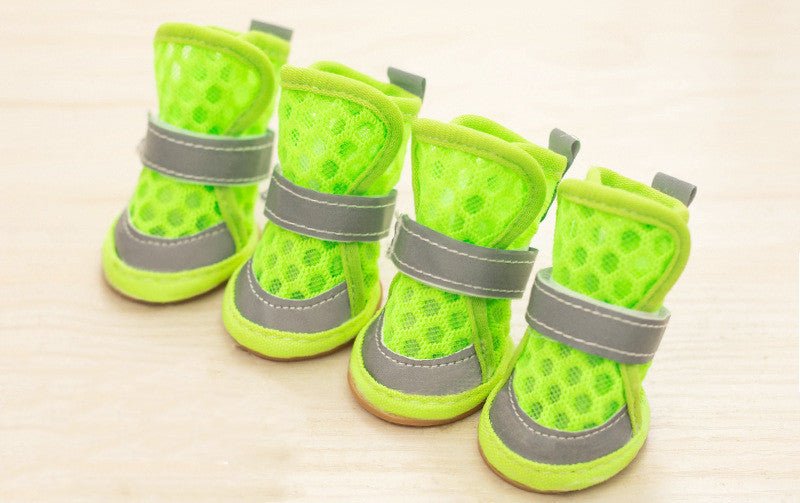 Small dog shoes in bright green with gray straps and padded tops, set of four