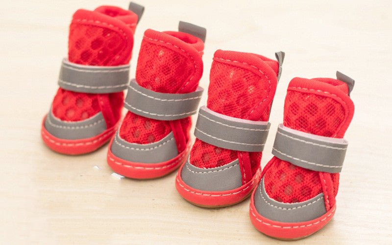 Small dog shoes in red with gray straps and padded tops, set of four