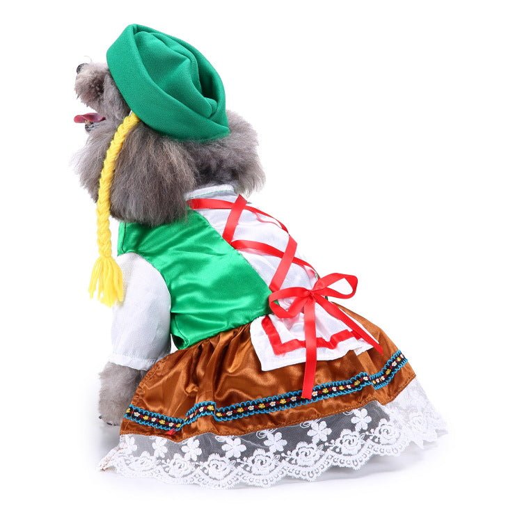 Green, white, and brown festive dog dress with red ribbon and gold-trim hem