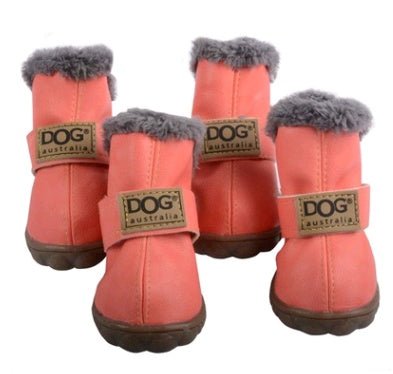 Pink-red dog snow boots with thick rubber sole, fluffy cuffs, and DOG logo straps