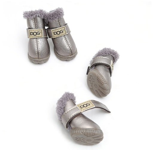 Silver dog snow boots with lavender-gray fur trim, thick sole, and DOG logo hook straps