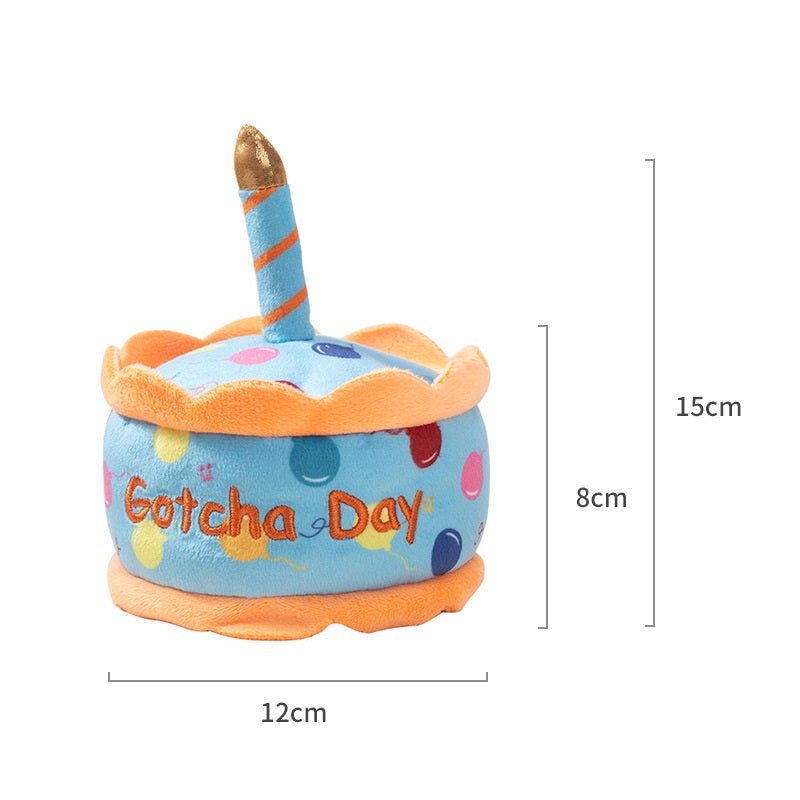 Squeaky dog 'Gotcha Day' plush toy with blue fabric body, candle, and orange trim