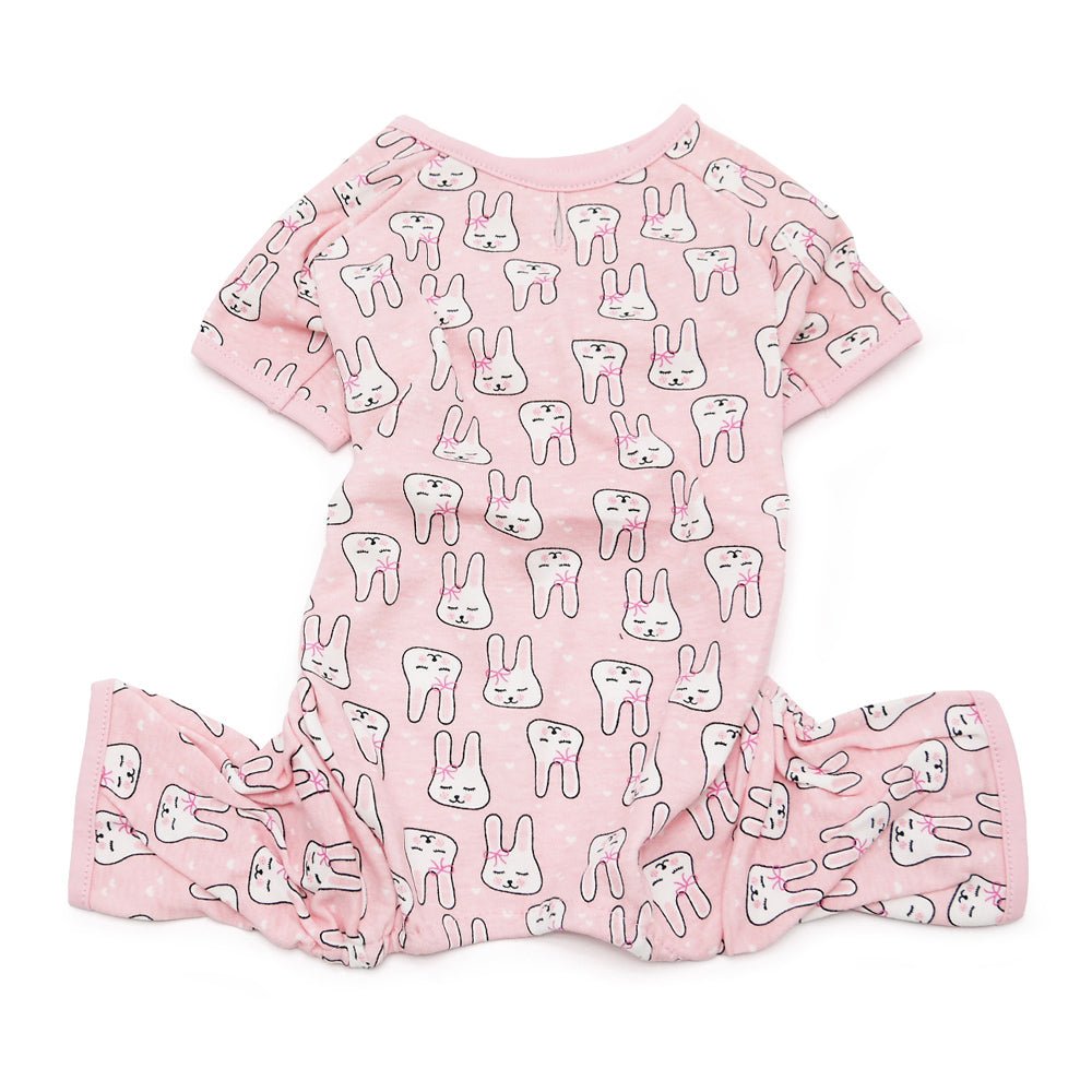 Pink short-sleeve dog pajama set with repeating bunny pattern and matching pants