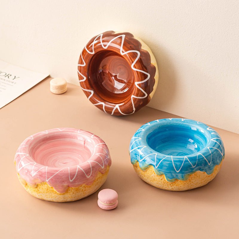 Donut ceramic pet bowl set with pink, blue, and brown glazes and white swirl details