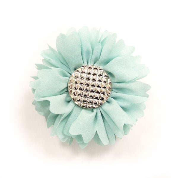 Light blue flower bow with textured rhinestone center, no visible clip