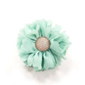 Light blue flower bow with rhinestone center on layered fabric petals