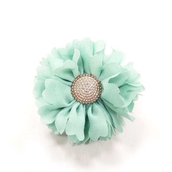 Light blue flower bow with rhinestone center on layered fabric petals