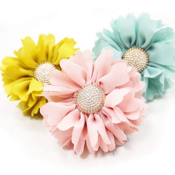 Triple flower bow with rhinestone centers in yellow, pink, and light blue