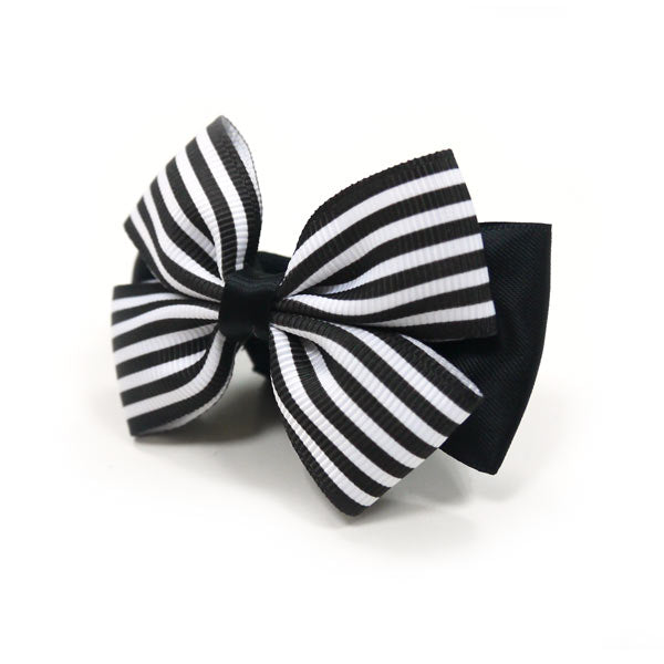 Striped bow tie with black backing, angled view