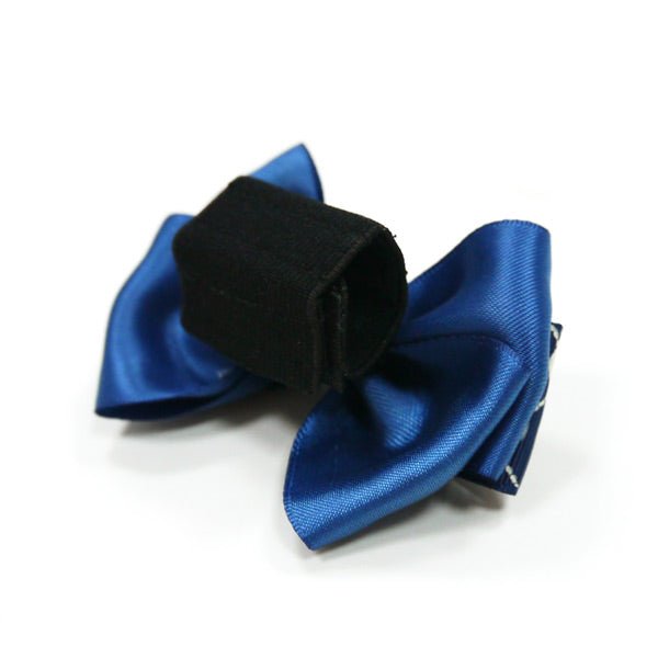 Blue patterned bow tie with navy hearts, black clip underside visible