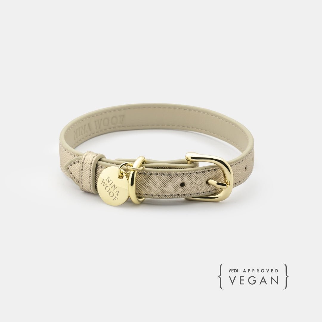 Beige vegan leather dog collar with gold buckle and engraved tag