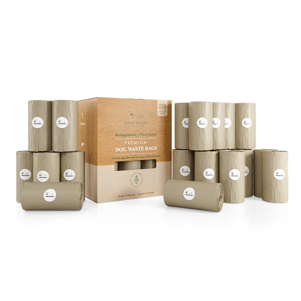 Premium biodegradable dog waste bags in box with multiple beige-gray roll packs