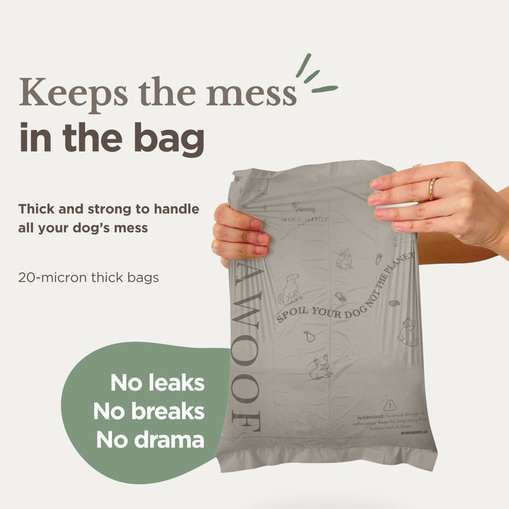 Gray dog waste bag held open by hands, thick compostable cleanup bag