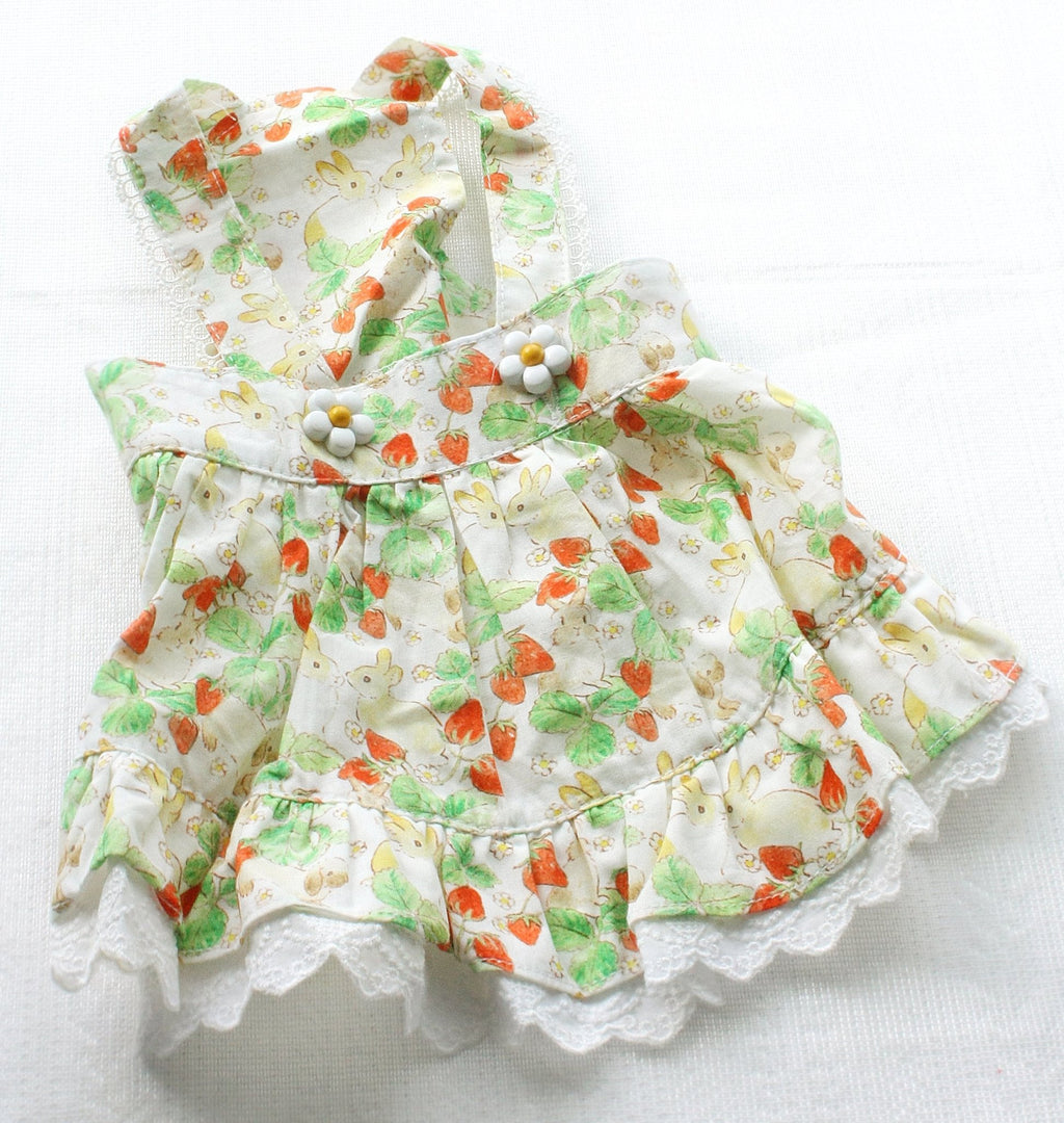 White floral rabbit-print pet dress with bow strap and layered ruffle hem