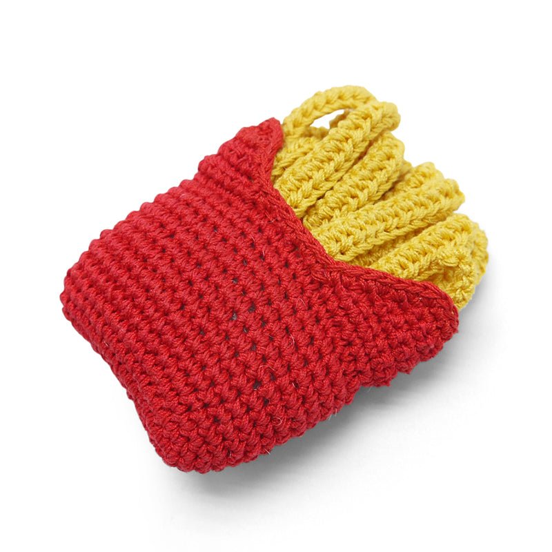 Crochet fries toy in red and yellow, angled view shows chunky stitch texture