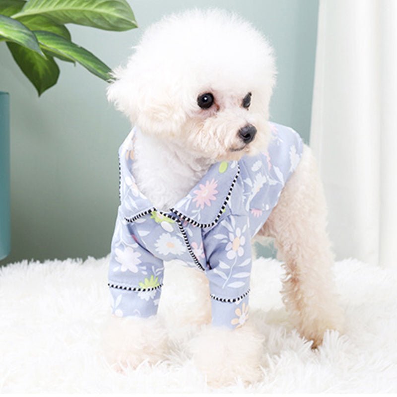 Light blue floral dog pajamas with white daisies and button placket