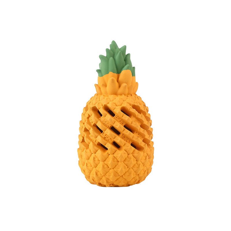 Orange fruit-shaped dog chew toy with green spiky top and oval bite opening