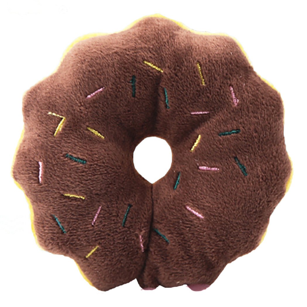 Brown donut plush vocal toy with colorful sprinkles and stitched fabric center hole