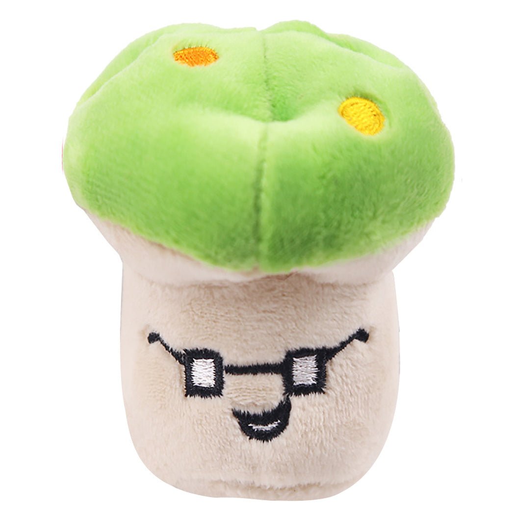 Plush chef hat mushroom pet toy in green cap and white body with smiling face