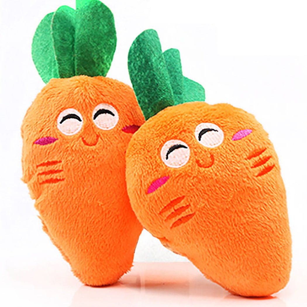 Pair of plush carrot-shaped pet toys in orange with green tops and cartoon faces