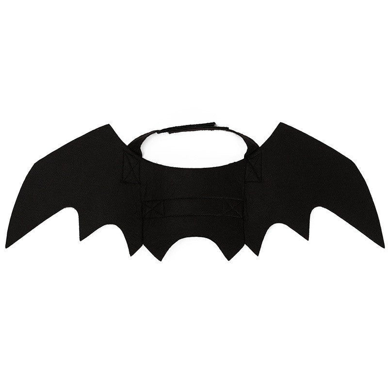 Black bat-wing pet costume piece with round neck opening and side strap ties.
