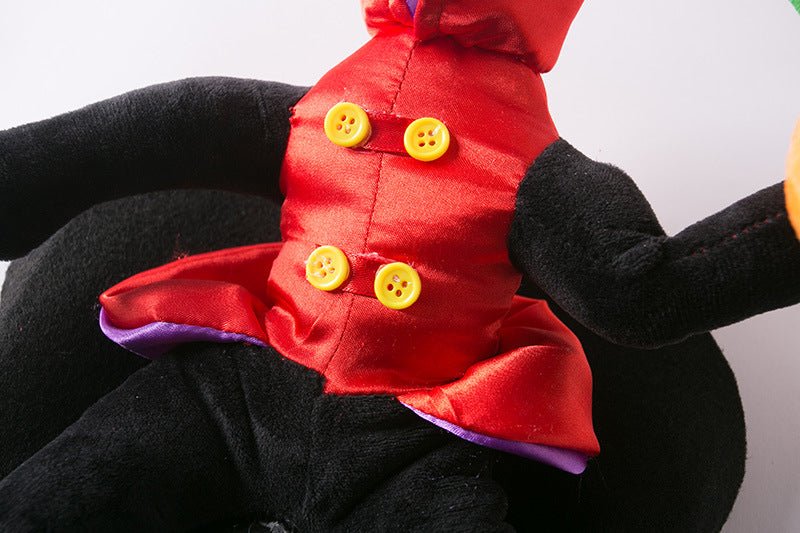 Halloween dog costume close-up: red tunic with yellow buttons and purple-lined cape