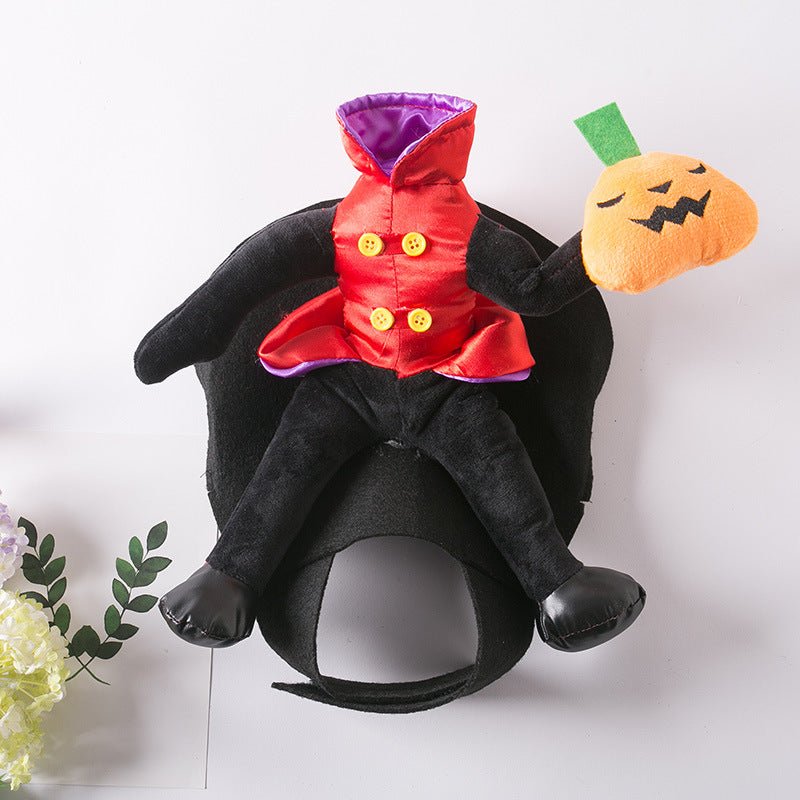 Halloween dog costume full-body: black plush legs with red tunic, purple hood, orange pumpkin toy