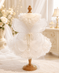 White pet wedding dress with layered tulle skirt and pearl butterfly applique detail