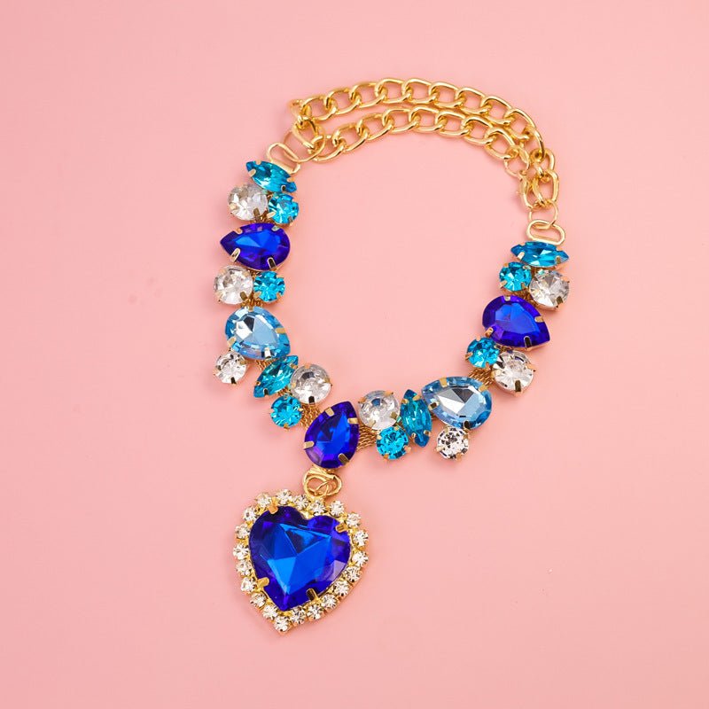 Crystal heart dog necklace with blue and clear crystal charms and a blue heart pendant