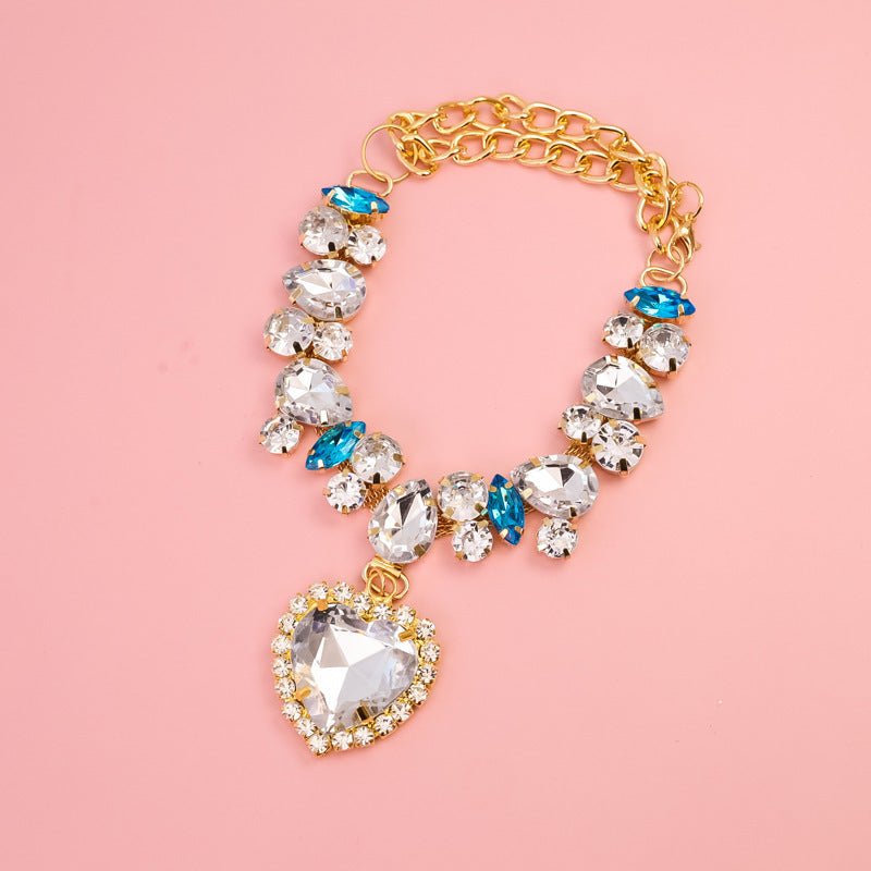 Crystal heart dog necklace with clear crystal charms and a clear heart pendant with sparkle trim