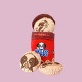 Red plush cylindrical dog toy with panda graphic and stitched beige top cover