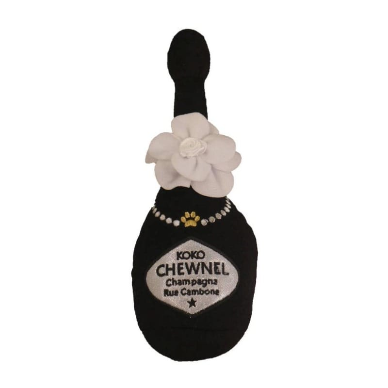 Black bottle-shaped plush squeak dog toy with flower topper and Koko Chewnel label