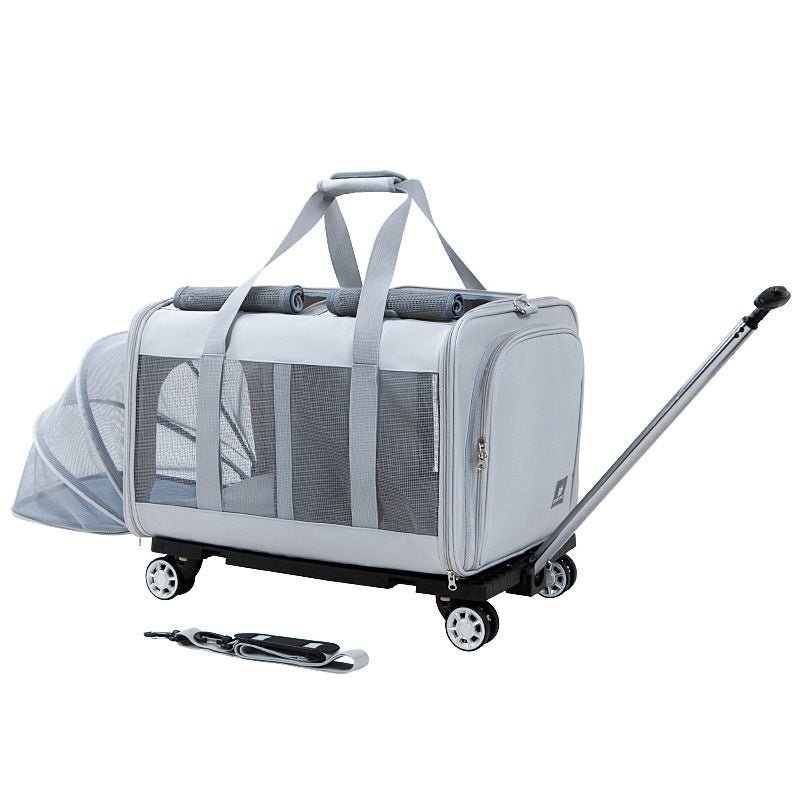 Light gray pet trolley bag with mesh panels, front pocket, and extendable handle